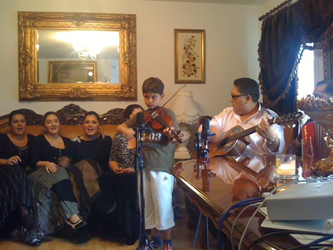 Recording with Gypsy Stars in Dudek and Beata's flat – thats Blanko, their son on violin. Dudek on guitar Recording with Gypsy Stars in Dudek and Beata's flat – thats Blanko, their son on violin. Dudek on guitar